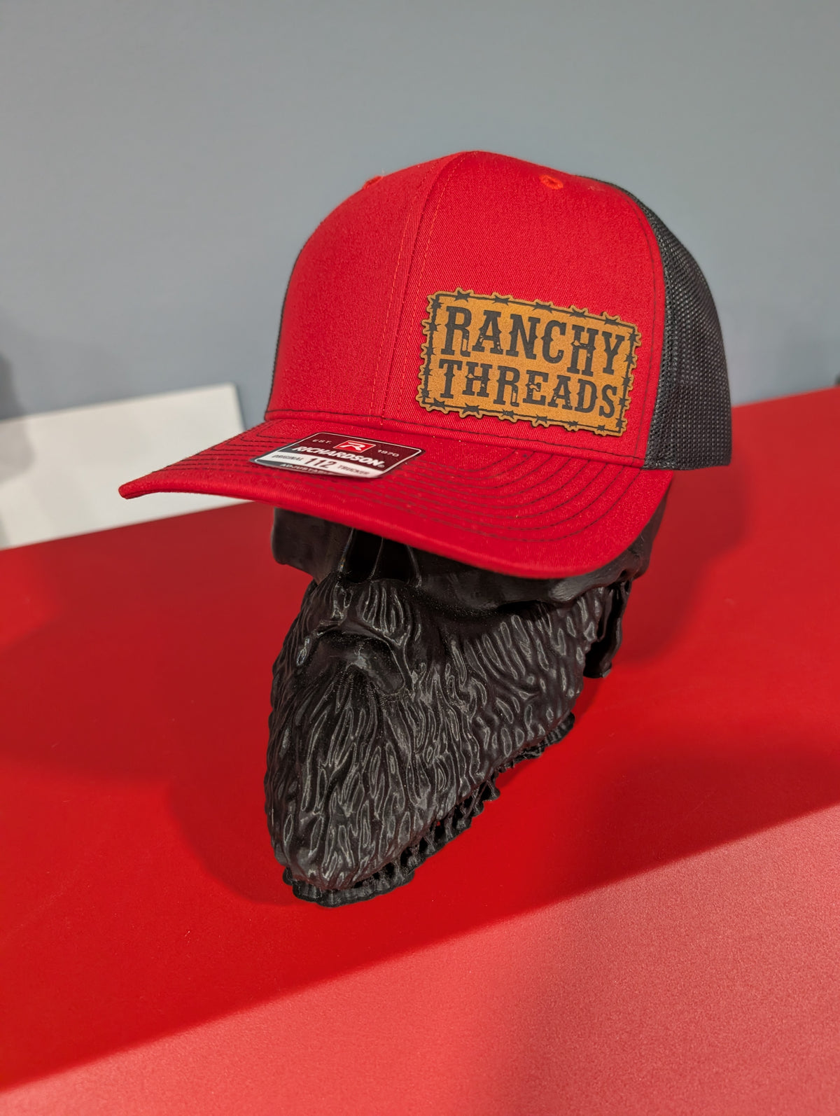 Red and Black trucker hat